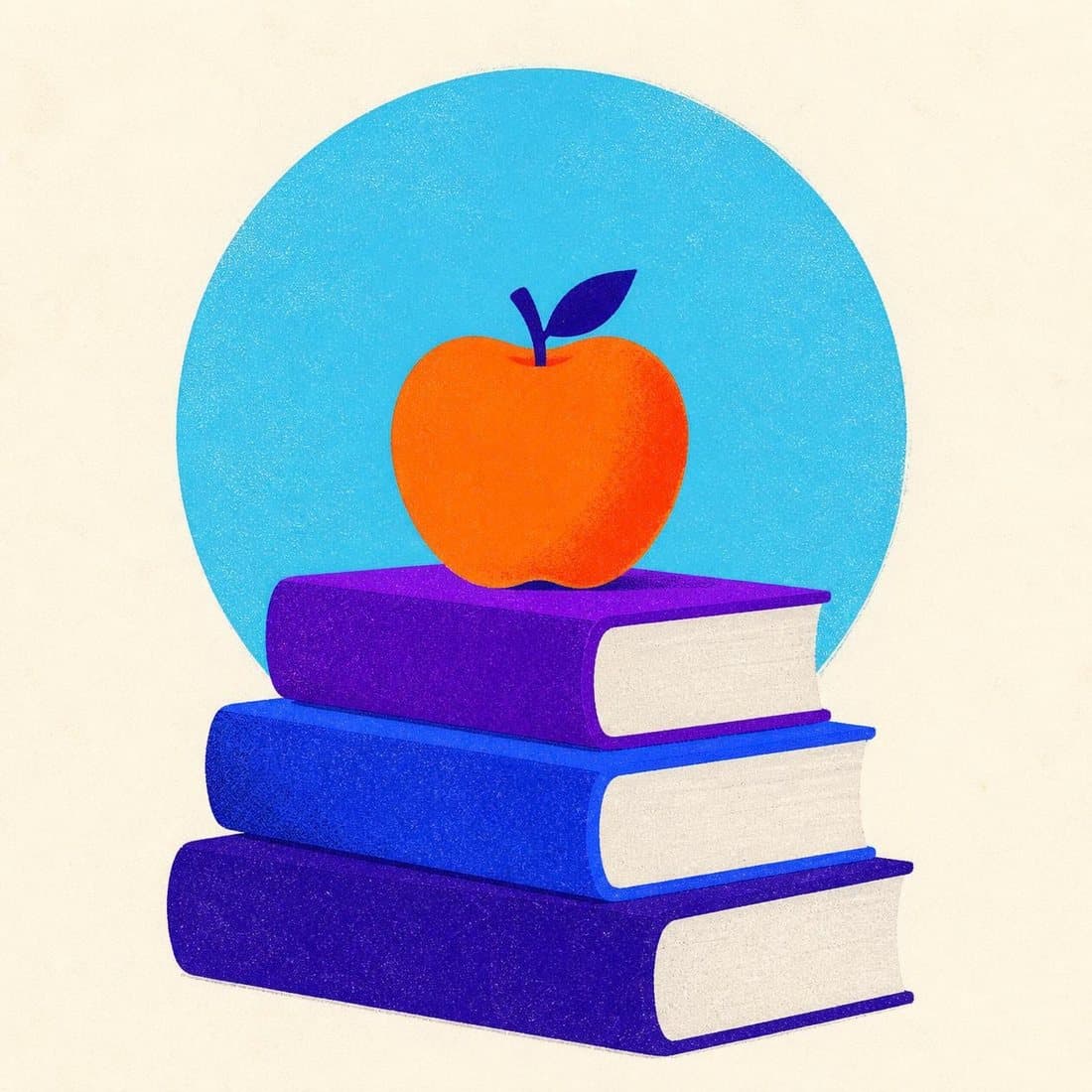 An orange apple on a stack of books